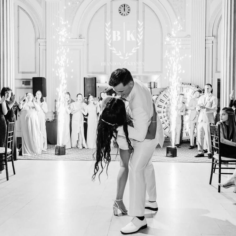 A beautiful wedding dance in Gainesville, FL, featuring a couple surrounded by loved ones.